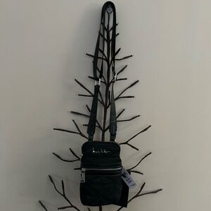 Brand new “Nicole Miller”crossbody mini bag for women.Size -w5”x8”inc.Black 🖤